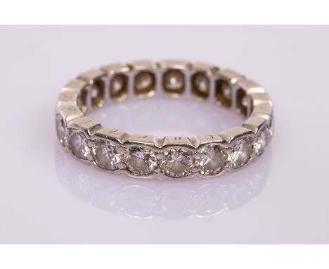 A diamond eternity ring, the nineteen stones with total estimated weight of 2ct, size L, approximately 4.4gm  CONDITION REPOR