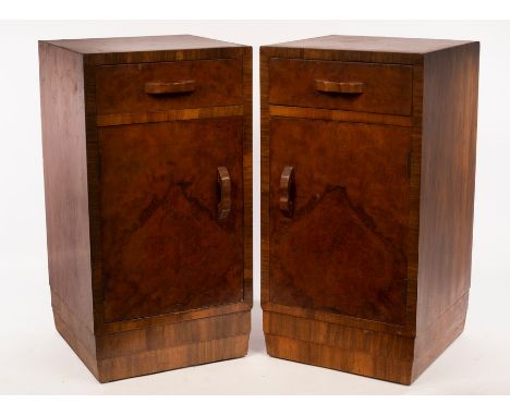 A pair of Art Deco bedside tables, each fitted a drawer above a cupboard with burrwood panel door, shaped handles and stepped