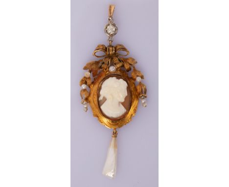 A shell cameo pendant, the oval cameo depicting a classical lady in profile beneath a ribbon tie and pearl studded frame, a m