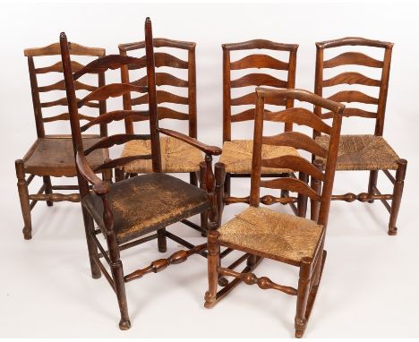A ladder back armchair and five rush seated ladder back single chairs CONDITION REPORT: Condition information is not usually 