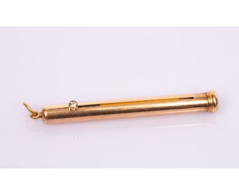 A gold propelling pencil by The Goldsmiths Company, with diamond set 'button', 8cm long approximately 10.4gm CONDITION REPORT