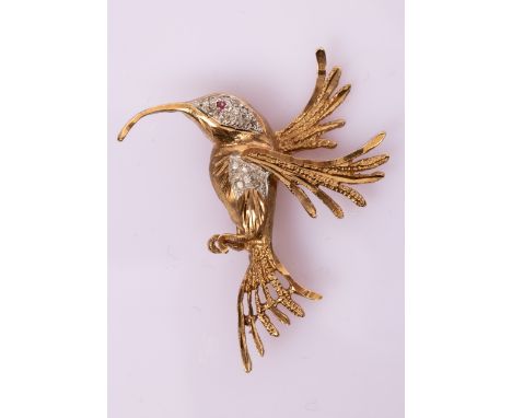 A gem set novelty brooch modelled as a hummingbird with ruby eye and diamond body, 48mm high CONDITION REPORT: Condition info
