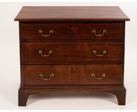 A George III mahogany chest of three long drawers on bracket feet, 39cm wide CONDITION REPORT: Ring and other noticeable stai