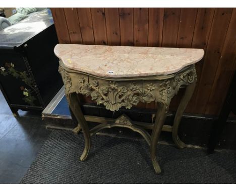 A marble top console table, with gold painted ornate base, W 95cm