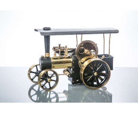 WEST GERMAN "WILESCO TRAKTOR" MODEL STEAM TRACTOR
modelled in painted black metal and brass, 19.5cm high