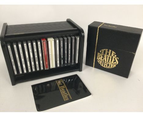 A Beatles 'Bread Bin' roll top 15CD album box set complete with booklet together with 'The Beatles Collection' 7inch single b