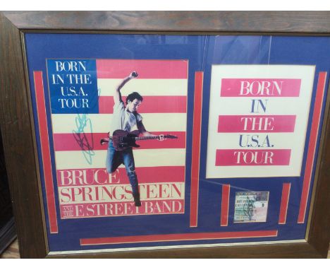 A framed and glazed signed Bruce Springsteen program and signed ticket from Wembley Stadium on Thursday, 4th July, 1985. Appr