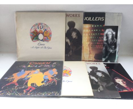 Eight Queen LPs comprising 'A Night At The Opera', 'A Kind Of Magic', 'The Works' and others.