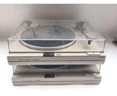 Three record players comprising two Fisher MT-125 models and a Garrard AP76 (3). One Fisher manual supplied.