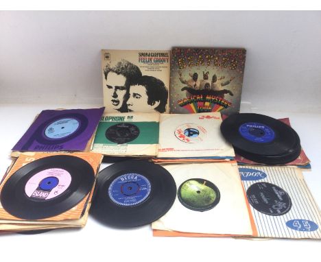 A collection of 1960s 7inch singles and EPs by various artists including The Beatles, Fairport Convention. Bob Dylan, Them an