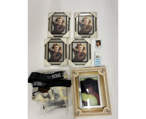 A selection of pop related framed photos, mirrors and other ephemera for Tina Turner, Michael Jackson and Kylie Minogue