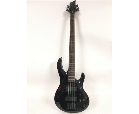 An ESP Ltd bass guitar, B-104. Serial number E049460. Comes with stand. No case.