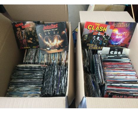 Two boxes of 7inch singles by various artists including Iron Maiden, Judas Priest, New Model Army, Queen and many more.