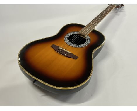 A Tanglewood Odyssey Acoustic Guitar sunburst finish with bowl back in very good condition with soft gigbag