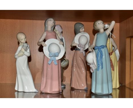 FOUR LLADRO FIGURES OF GIRLS WITH HATS AND TWO OTHER SPANISH PORCELAIN FIGURES, comprising Naughty Girl, No. 5006, Bashful Gi