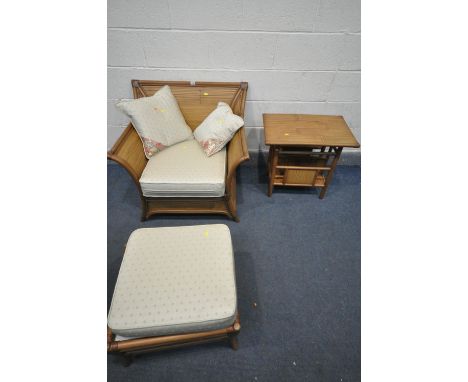 A BAMBOO EFFECT THREE PIECE CONSERVATORY SUITE, comprising an armchair, a pouffe, and a magazine rack/table (3)