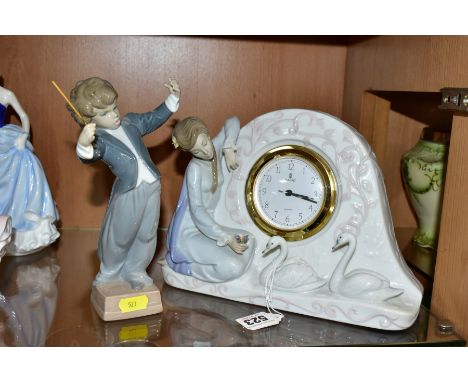 BOXED LLADRO CLOCK AND FIGURINE, comprising a Swan Clock 5777, height 18cm x width 26cm x depth 9cm, sculptor Vicente Martíne