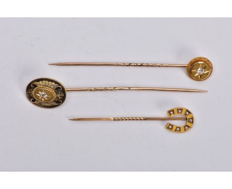 THREE STICKPINS, to include a late Victorian 9ct gold split pearl horseshoe stickpin, hallmarked 9ct Chester 1897, length of 