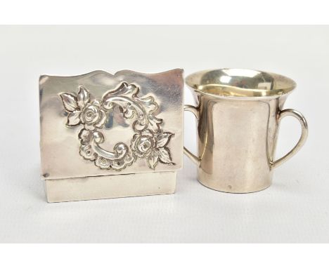 A LATE VICTORIAN SILVER SNUFF BOX AND A LATE VICTORIAN THREE HANDLED CUP, the first of rectangular-shape outline with embosse