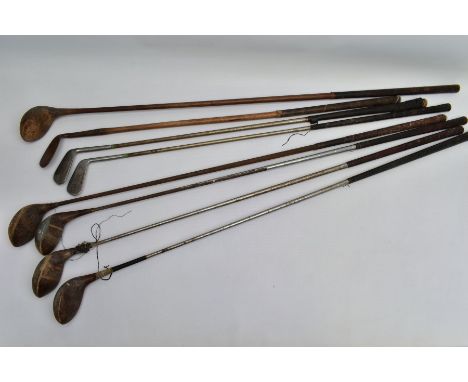 EIGHT VINTAGE GOLF CLUBS, comprising a wooden shaft driver and wedge and steel shaft clubs comprising a number 2 and 4 wedge 