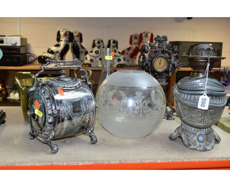 A GROUP OF VICTORIAN / EDWARDIAN METALWARES, comprising a cast metal novelty oil lamp in the form of a knight's helmet, with 