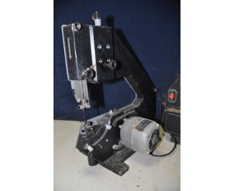 A BLACK AND DECKER BD-339 band saw along with a NU-TOOL GROUR HBS10 three speed band saw/belt sander (NO BLADE) (both PAT pas