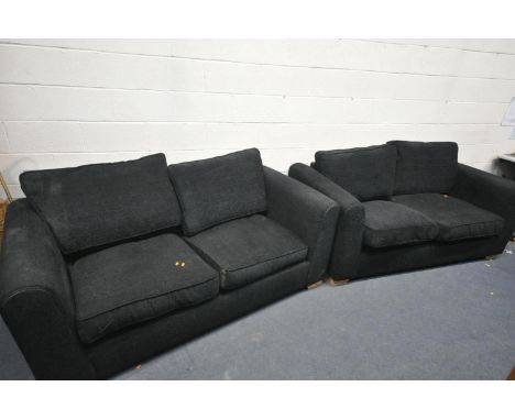 TWO DFS BLACK UPHOLSTERED SOFA BEDS, length 186cm