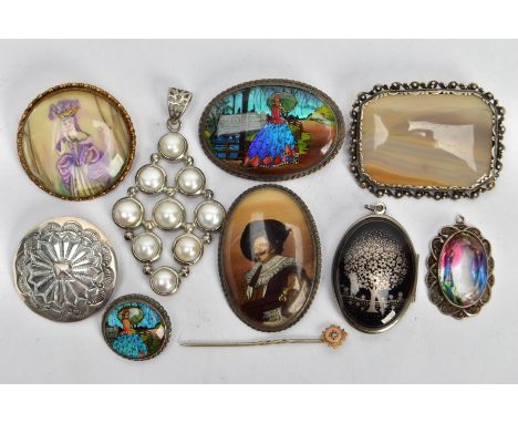 SIX BROOCHES, THREE PENDANTS AND A STICK PIN, the brooches include two butterfly wing brooches, two portrait brooches, a band