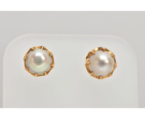 A PAIR OF YELLOW METAL CULTURED PEARL EARRINGS, each ear stud set with a cultured pearl, measuring approximately 8.00mm x 7.9