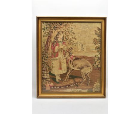 A VICTORIAN HAND SEWN TAPESTRY DEPICTING A YOUNG FEMALE FIGURE PUTTING FLOWER GARLANDS ONTO A DEER, later framed and glazed, 
