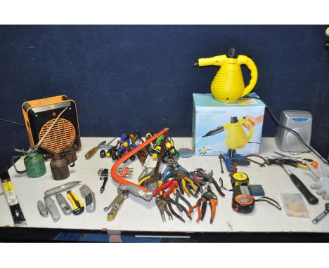 A COLLECTION OF TOOLS AND ELECTRICALS to include pliers, snips, tape measures, scissors, screwdrivers etc three vintage oil c