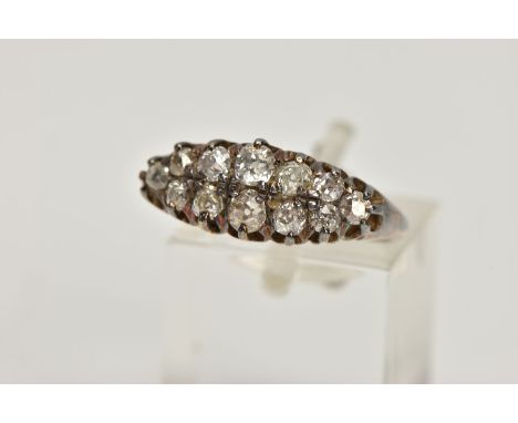 AN OLD CUT DIAMOND DRESS RING, the graduated old cut diamond rows, with openwork gallery and tapered band, estimated total di