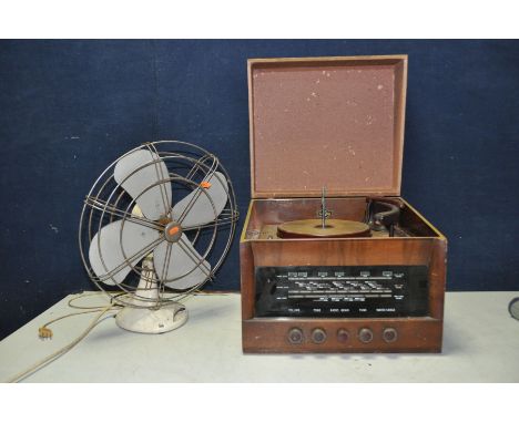 A VINTAGE COLUMBIA RADIOGRAM MODEL C.403 with turntable along with a vintage desk fan (both PAT fail due to uninsulated plugs