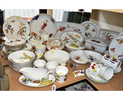 ROYAL WORCESTER PORCELAIN EVESHAM DINNER SERVICE, including twelve serving dishes of various shapes, three with lids (one dis