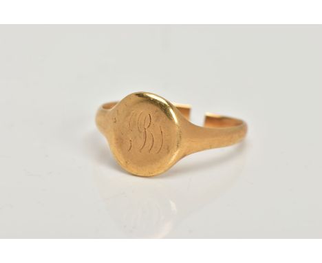 AN AF 18CT GOLD SIGNET RING, oval signet with worn engraved initials, tapered plain polished split shank, hallmarked 18ct Bir