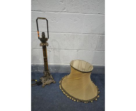 A 19TH CENTURY OIL LAMP, converted to a table lamp, lacks original upper fittings, the base with cast gilt metal collar, abov