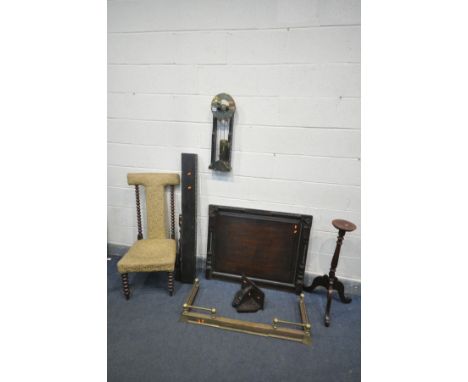 A COLLECTION OF OCCASIONAL FURNITURE, to include a brass and oak wall mounted water clock, a brass extending fender, a walnut