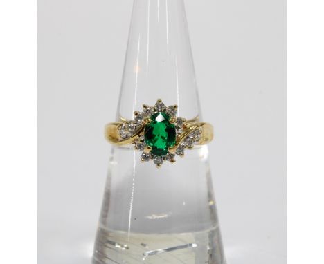 18ct diamond and emerald dress ring, stamped 750