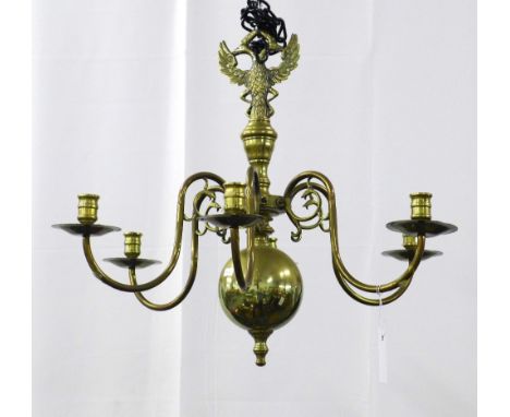 19th century Dutch six branch chandelier with a double-headed eagle finial, the branches ending in candle nozzles and drip pa