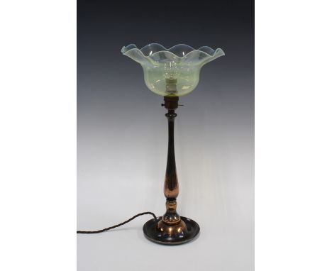 Copper table lamp with a straw opal glass shade with wavy rim in the manner of Powell, 46cm