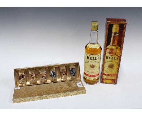 A set of six vintage 'Hunting Dog' pattern shot glasses, boxed and a bottle of Bell's Old Scotch Whisky