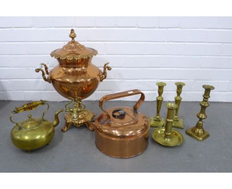 Copper samovar / urn  with brass tap, 46cm tall, together with a copper kettle, brass kettle, and four brass candlesticks (7)