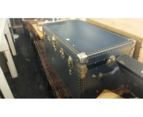A large vintage travel trunk