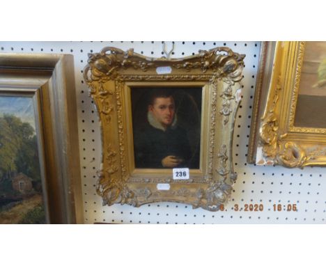 A gilt framed portrait study on board of a gentleman wearing a ruffle 