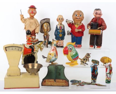 Mixed quantity of Tinplate Novelty toys, including: scales (maker unknown) Japanese Yoneya Parrot, Wells Brimtoy lithographed