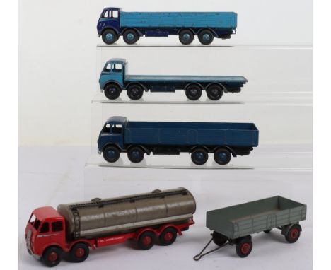 Four Dinky Toys Foden 1st type trucks, 501 Diesel 8-wheel wagon blue cab, back and hubs, black chassis and silver flash, fair