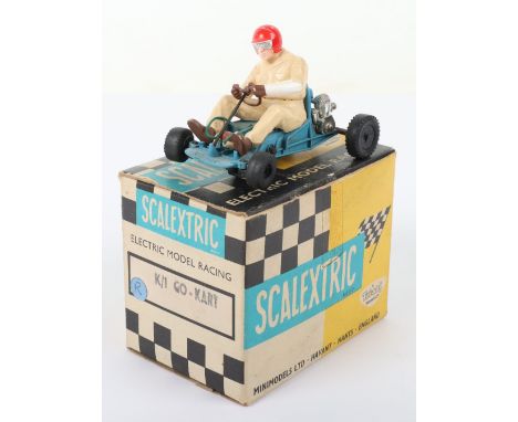 Scalextric K/1 Go Kart, blue kart, driver with red helmet, in fair condition, box is in good condition, correct colour spot, 