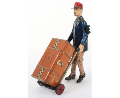 Lehmann (German) EPL 689 Adam the Porter tinplate clockwork toy, circa 1920, porter with blue painted jacket, Lehmann pattern
