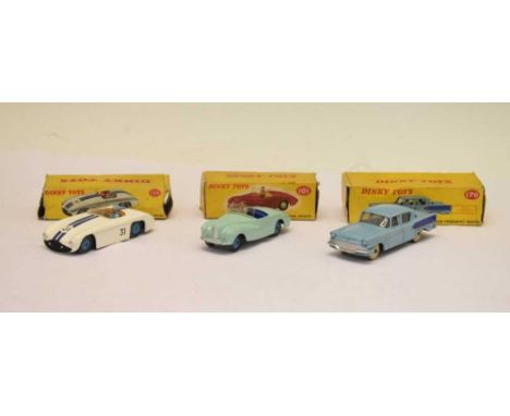 Dinky Toys - Three boxed diecast model vehicles comprising; 101 'Sunbeam Alpine Sports', 133 'Cunningham C-5R Road Racer' and