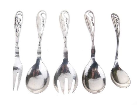 Georg Jensen - Pair of hammered silver salad serving spoons, import marks for London 1926; together with a spoon, sugar spoon